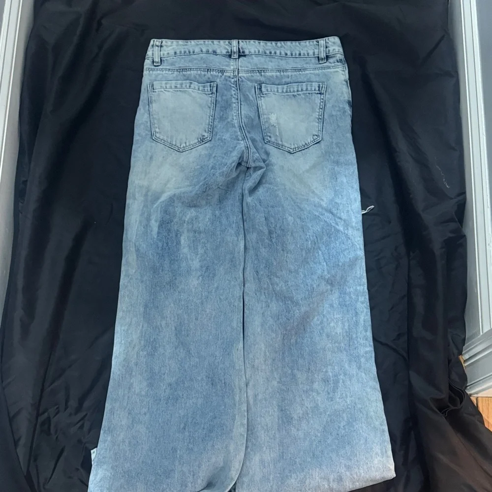 Distressed Light Blue Jeans - Picture 2 of 3